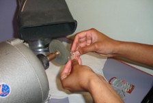 Close-up of hands holding audiology equipment