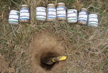 Soil samples beside a hole