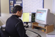 Nepia Mahuika sitting at his computer