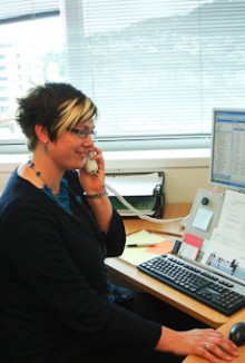 Laura Feasey talking on the telephone.