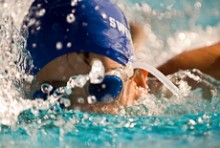 A swimmer taking a breath