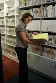 Josie Simpson looking at a file