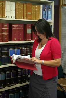 Phena Byrne reading a law textbook