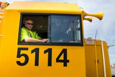 Jim Featherston looking out of the window of a locomotive