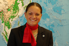Jessica Strawbridge in front of a map of the world