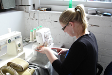 Nickki Burnet at her sewing machine