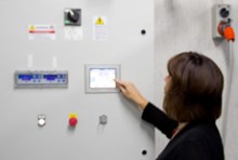 Julia Horsfield checking a monitoring panel