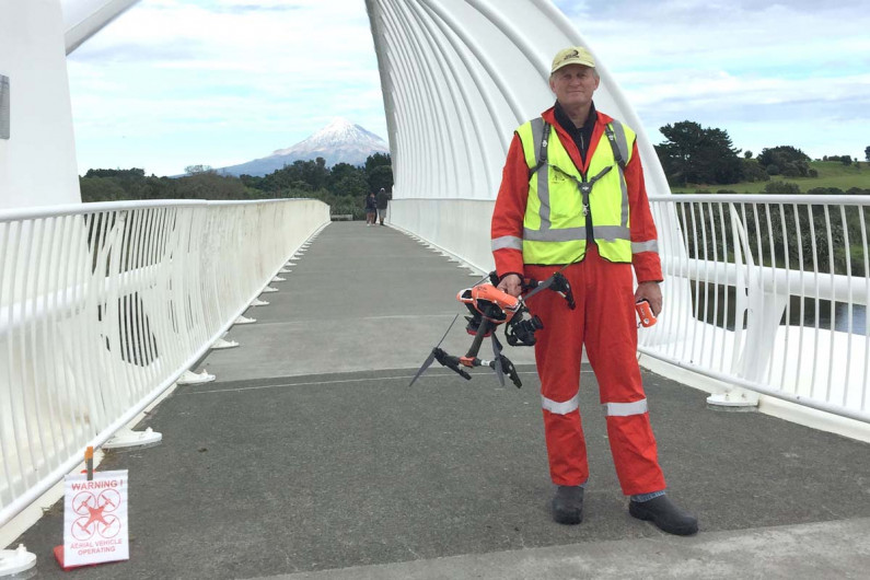 Bevin Lealand setting up a drone flight