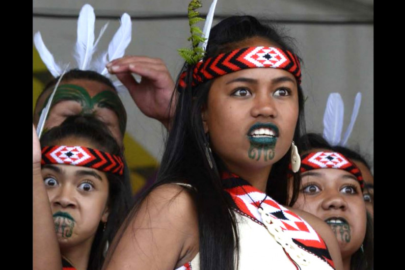 Young Māori performing kapa haka