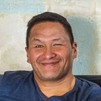 Man smiles at camera