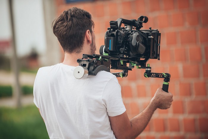 Camera operator filming a scene