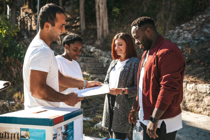 Health promoters talk to people in the community about managing their health