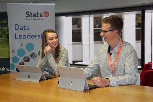 Two colleagues from Statistics New Zealand analyse data