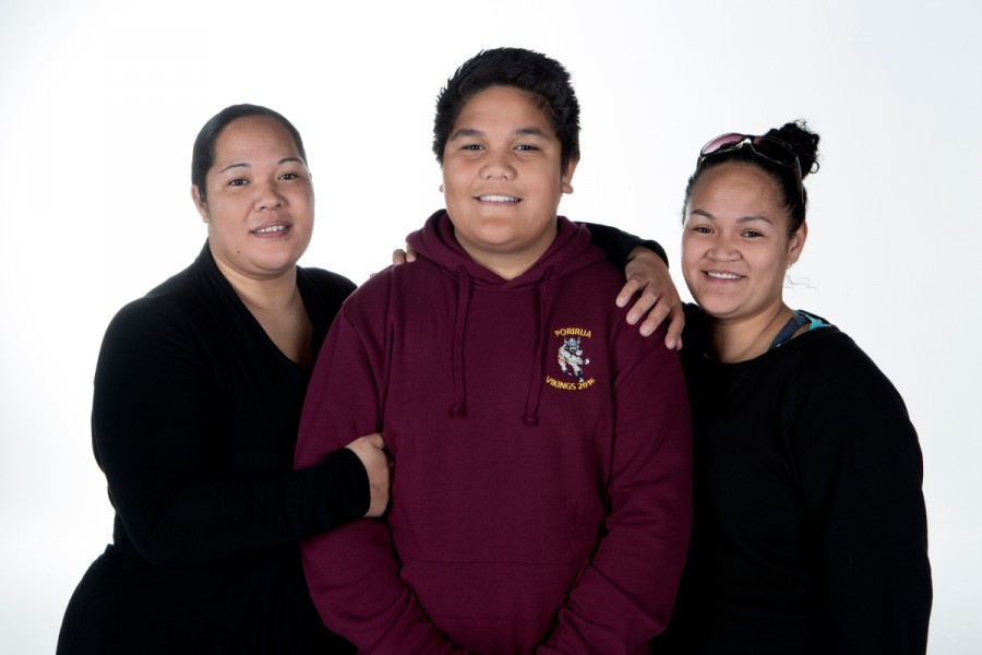Three members of a Pasifika family